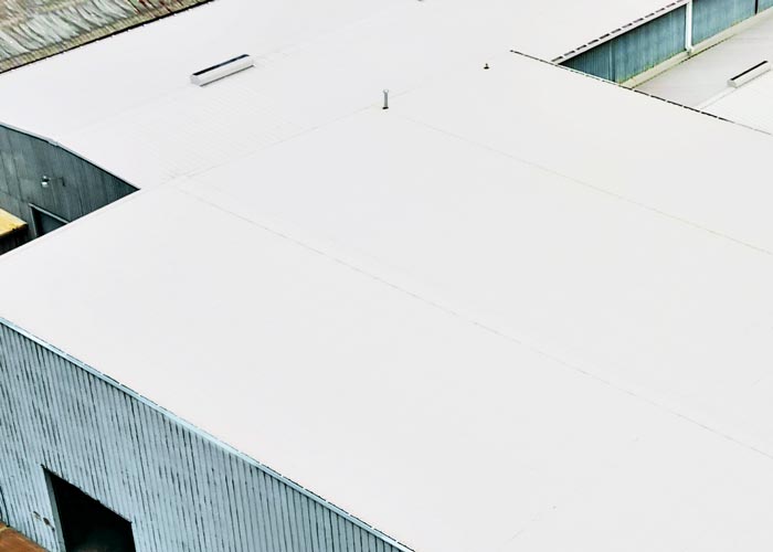 2-ind-metal-roof2flat Sovereign Storm Solutions Commercial Roofing